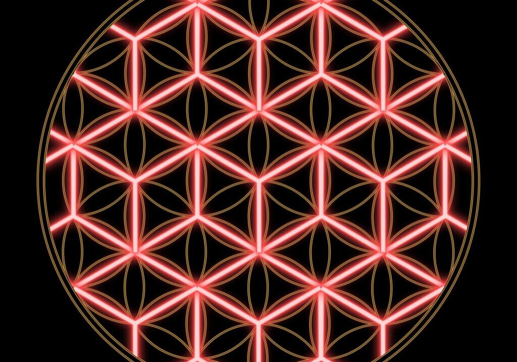 A glowing red flower of life is shown.